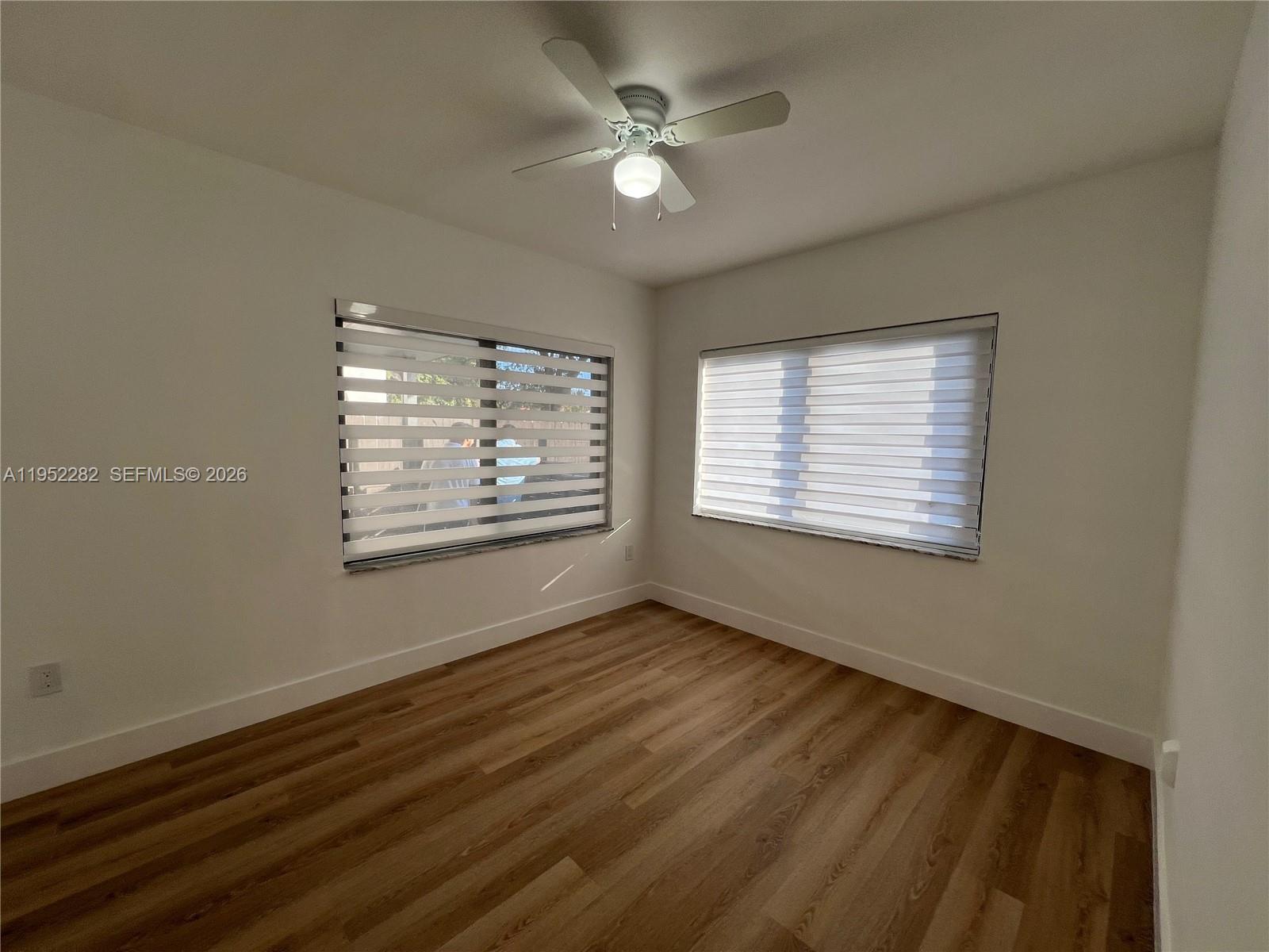 3297 Southwest 26th Street, Unit 3297 Miami, FL 33133 - Photo 9 of 20 a view of an empty room with a window