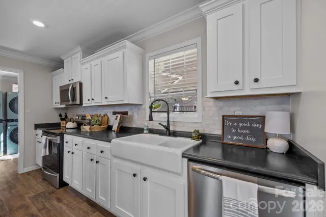 a bathroom with a shower and a sink