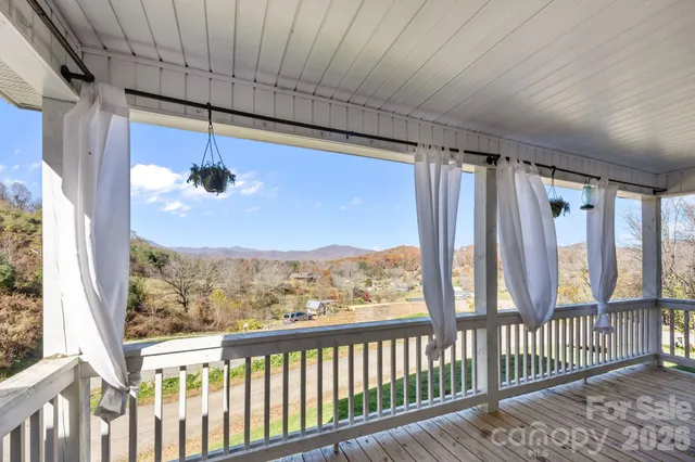 a kitchen with stainless steel appliances granite countertop white cabinets sink and dishwasher