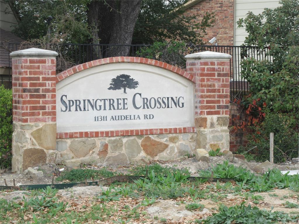 11311 Audelia Road, Unit 241 Dallas, TX 75243 - Photo 9 of 11 a sign on the side of a building