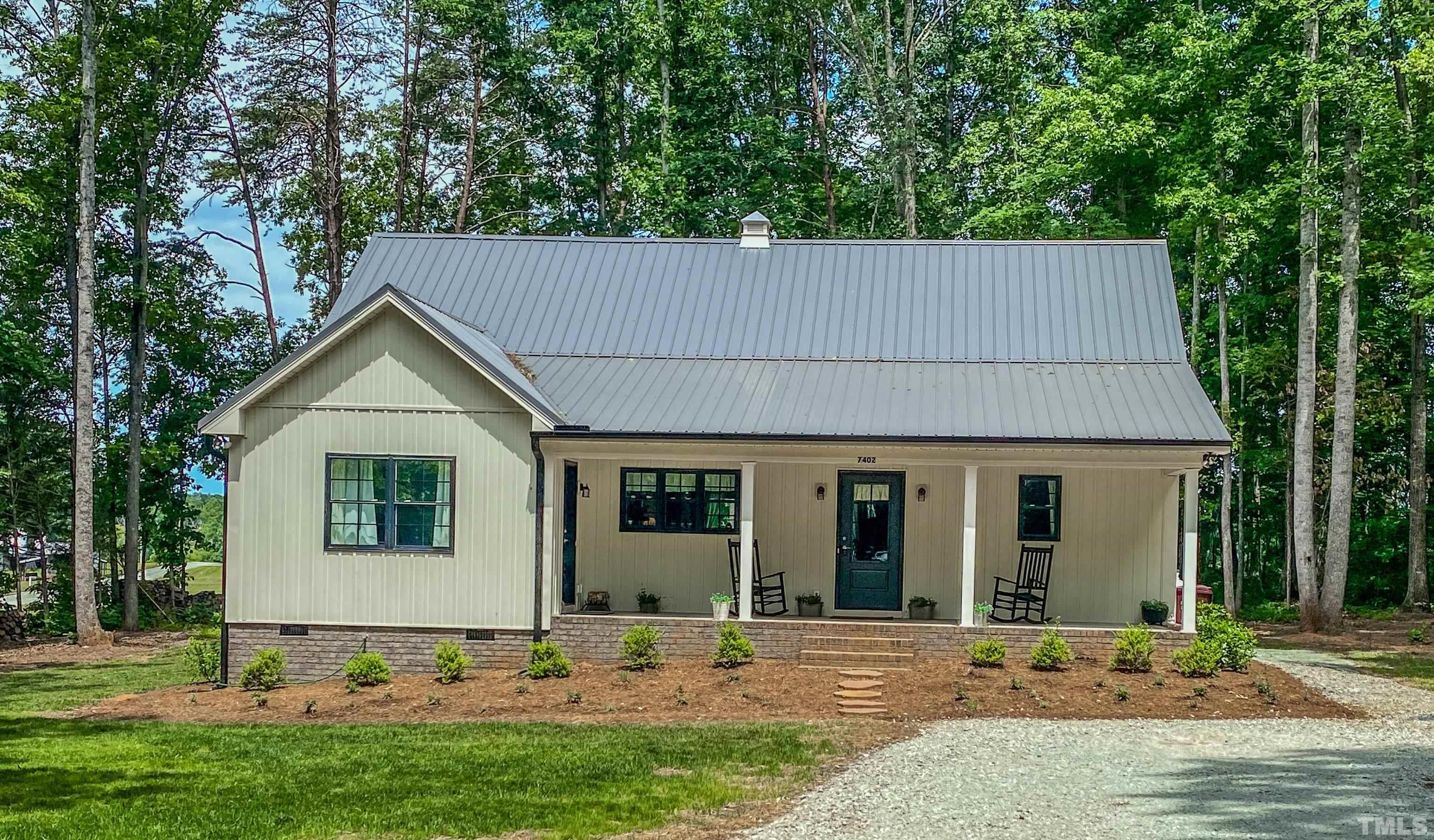 7402 Deer Crossing Road Rougemont, NC 27572 - Photo 1 of 54 a view of a house with a yard