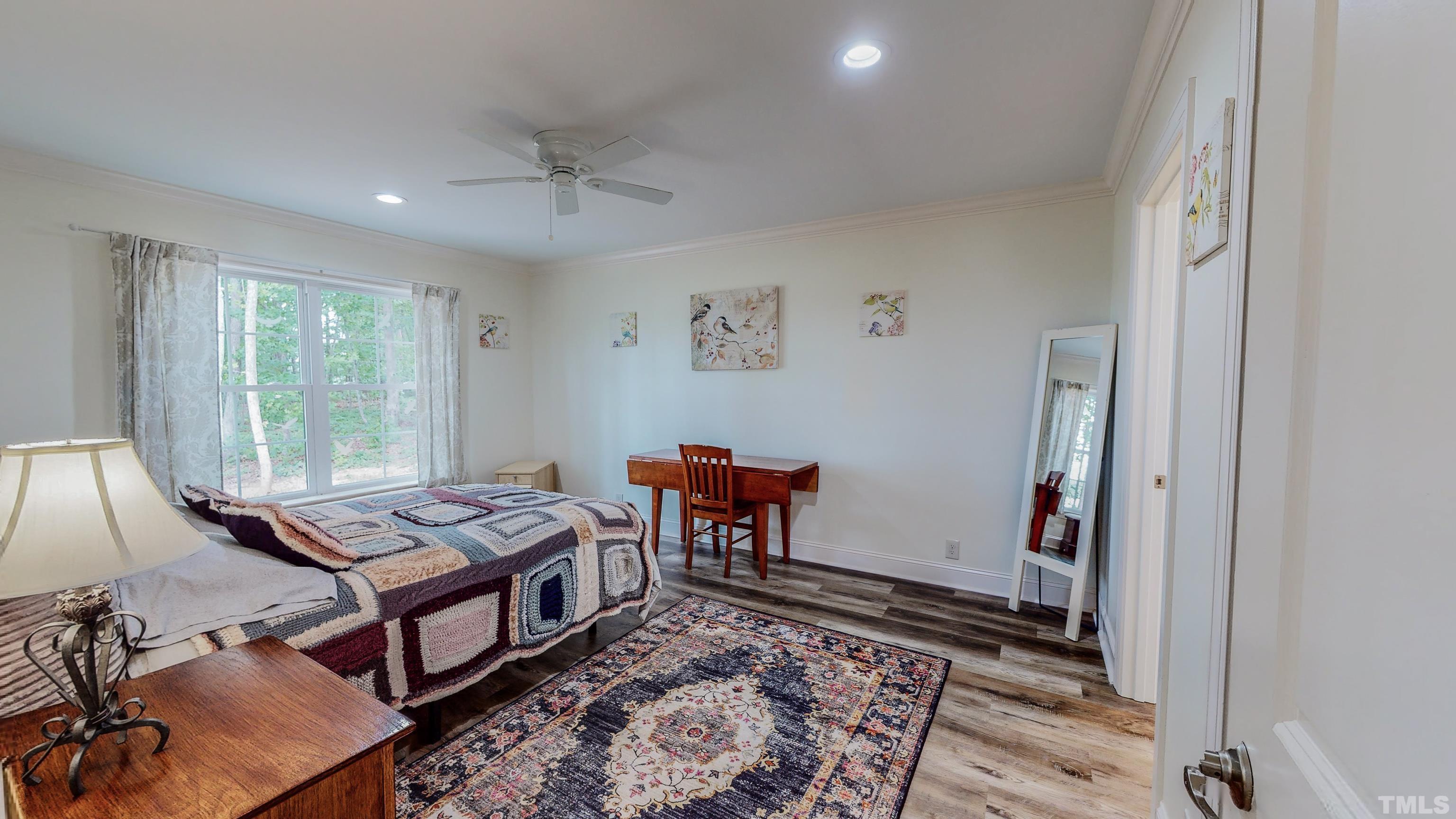 7402 Deer Crossing Road Rougemont, NC 27572 - Photo 14 of 54 a bed room with a bed and a window