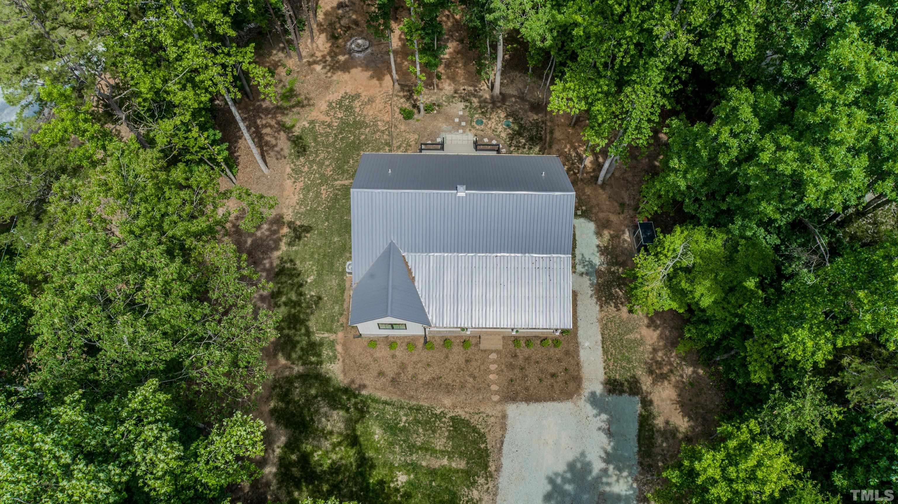 7402 Deer Crossing Road Rougemont, NC 27572 - Photo 48 of 54 an aerial view of a house with a yard
