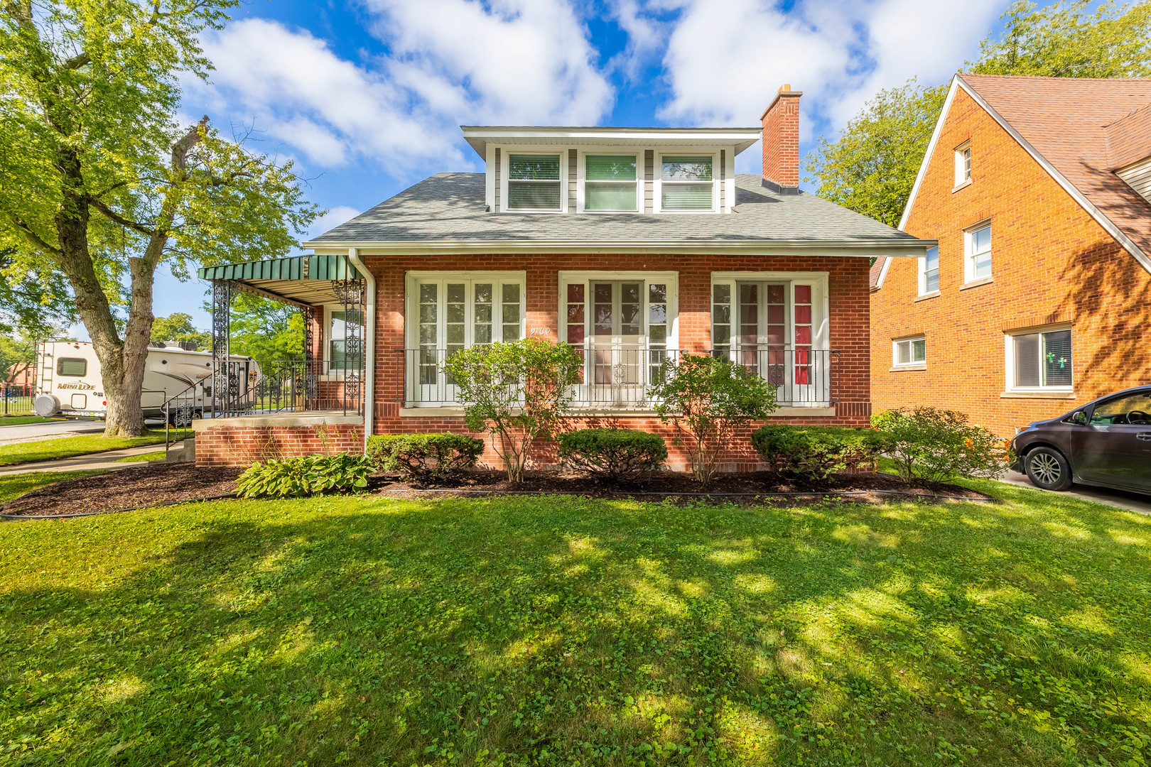 9160 South Hamilton Avenue Chicago, IL 60643 - Photo 2 of 53 a view of a house with a big yard and potted plants