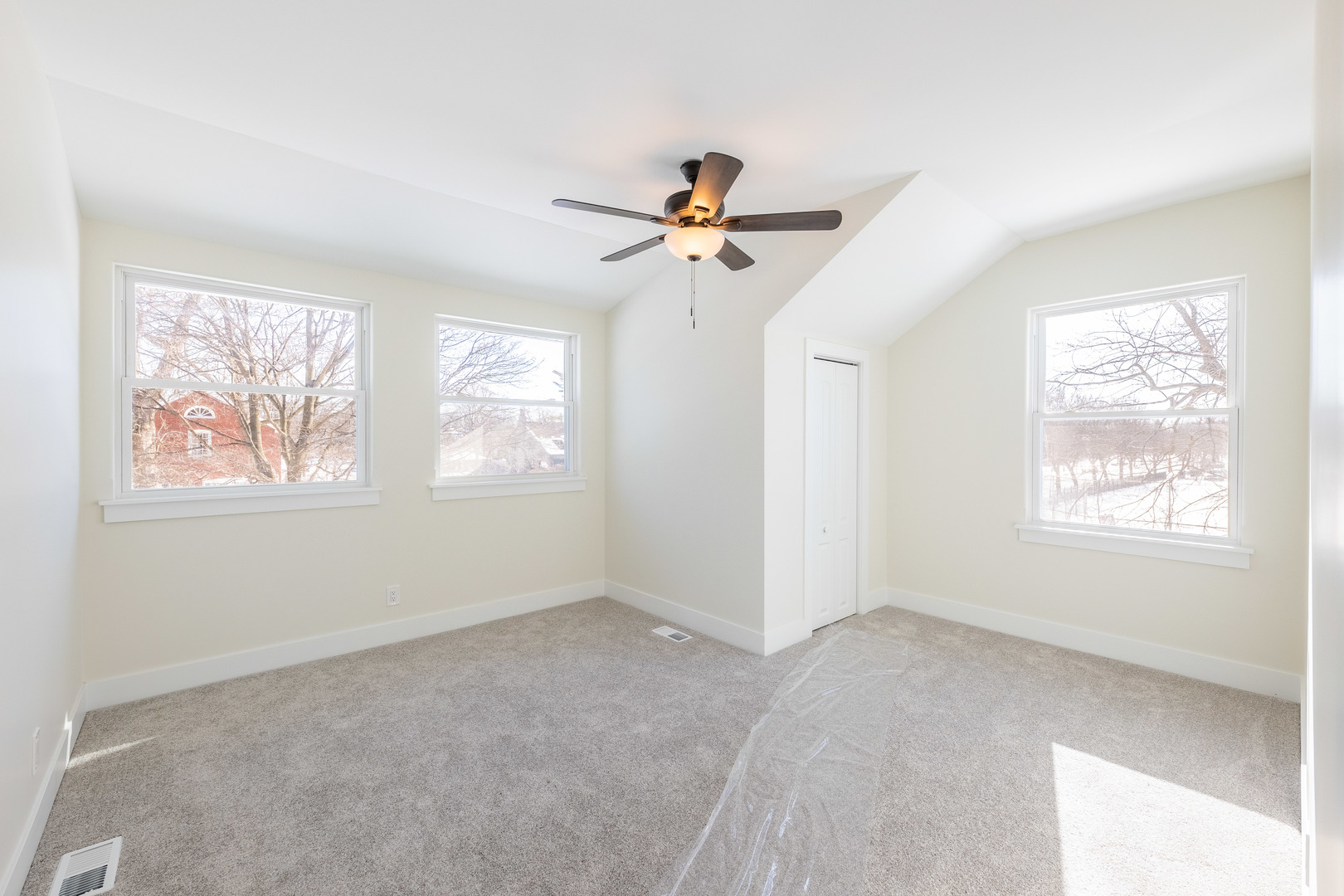 9160 South Hamilton Avenue Chicago, IL 60643 - Photo 21 of 53 a view of a big room with windows and chandelier fan
