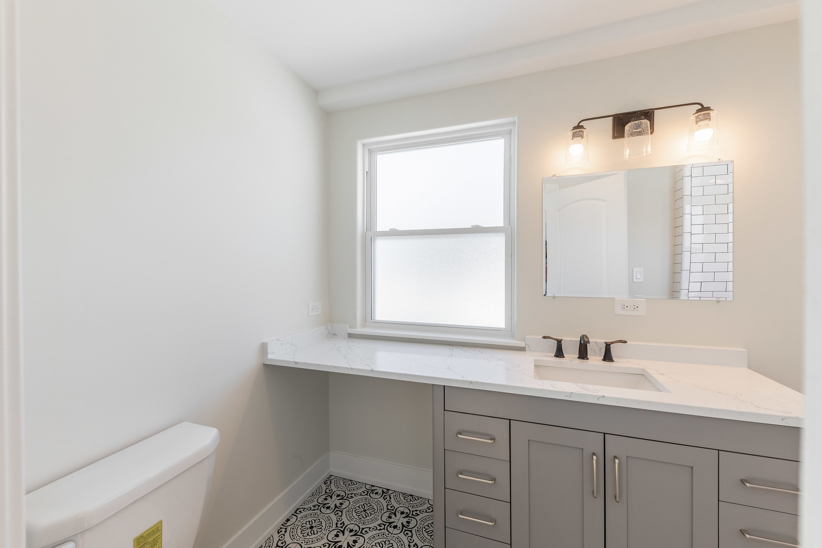 9160 South Hamilton Avenue Chicago, IL 60643 - Photo 24 of 53 a bathroom with a sink a toilet and a window