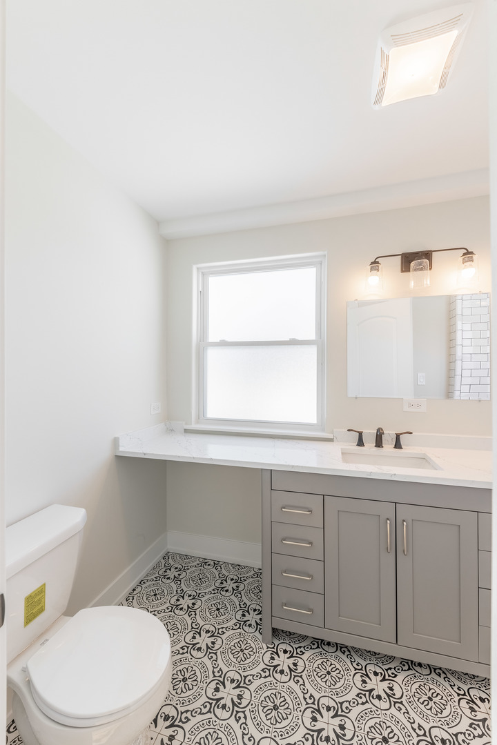 9160 South Hamilton Avenue Chicago, IL 60643 - Photo 25 of 53 a bathroom with a sink a toilet and window