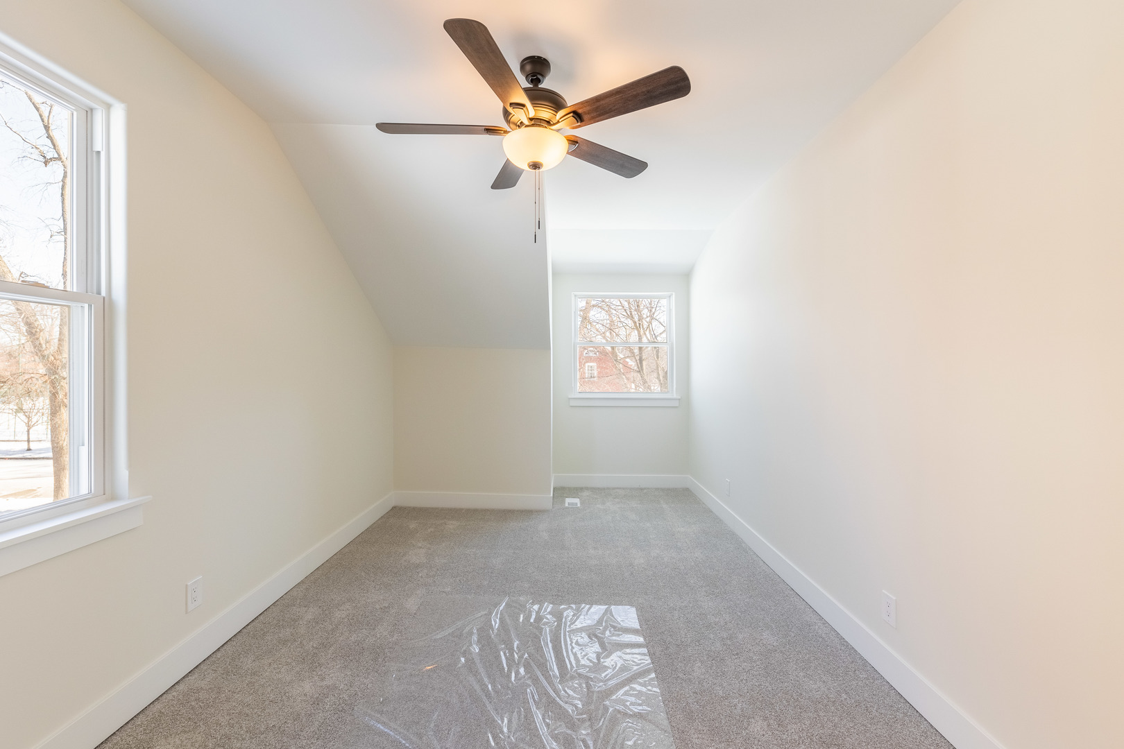9160 South Hamilton Avenue Chicago, IL 60643 - Photo 31 of 53 an empty room with a window and a fan
