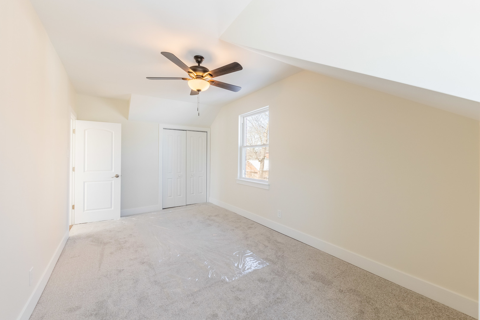 9160 South Hamilton Avenue Chicago, IL 60643 - Photo 32 of 53 an empty room with a window and a fan