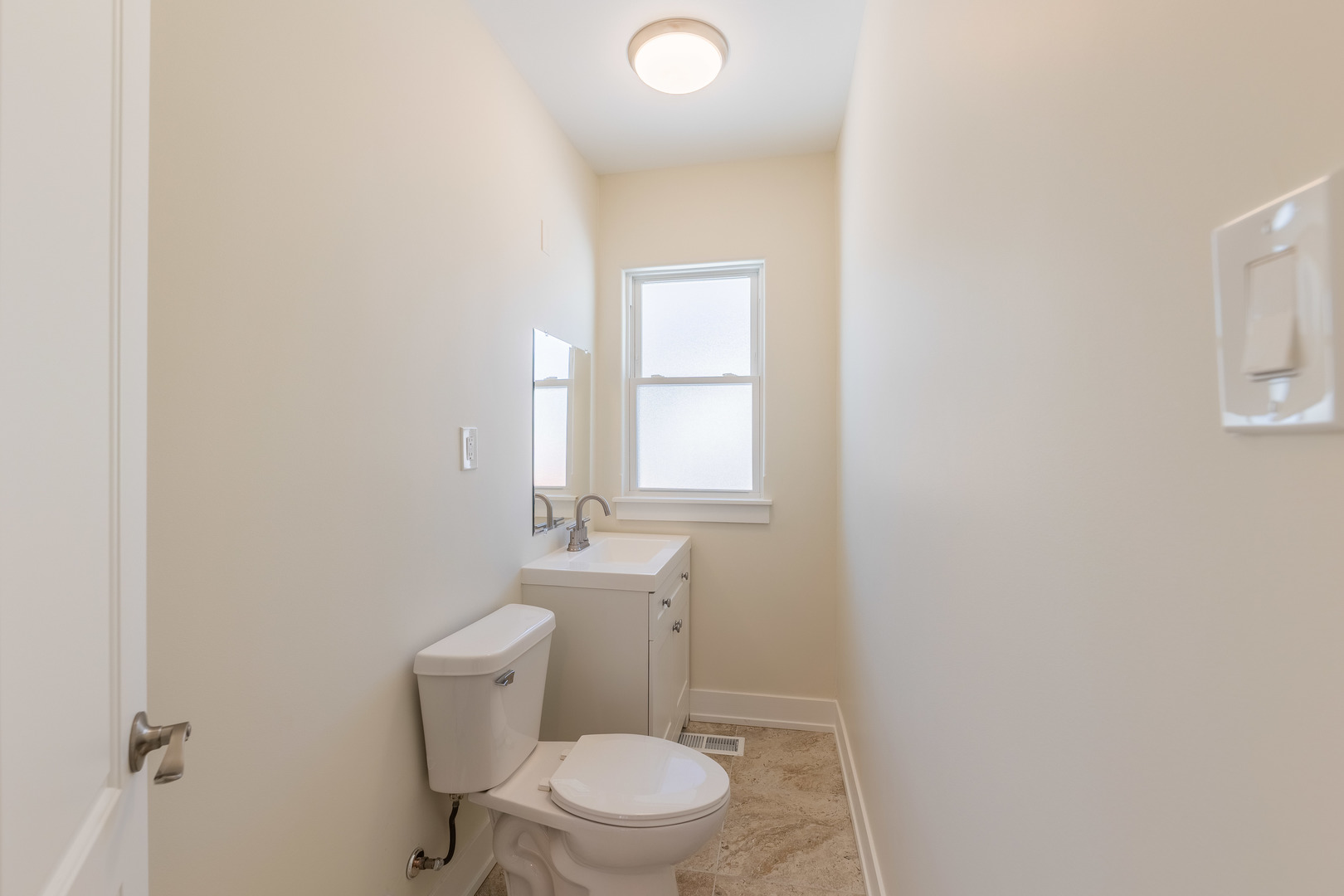 9160 South Hamilton Avenue Chicago, IL 60643 - Photo 35 of 53 a white toilet sitting next to a bathroom sink