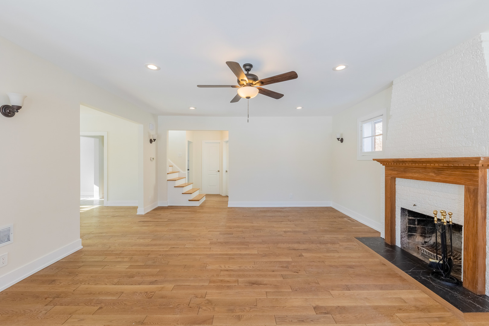 9160 South Hamilton Avenue Chicago, IL 60643 - Photo 5 of 53 a view of an empty room with a fireplace