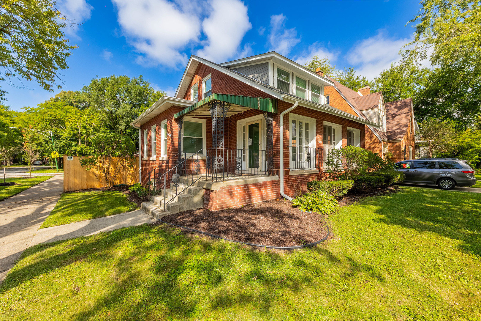 9160 South Hamilton Avenue Chicago, IL 60643 - Photo 52 of 53 a front view of a house with a yard table and chairs