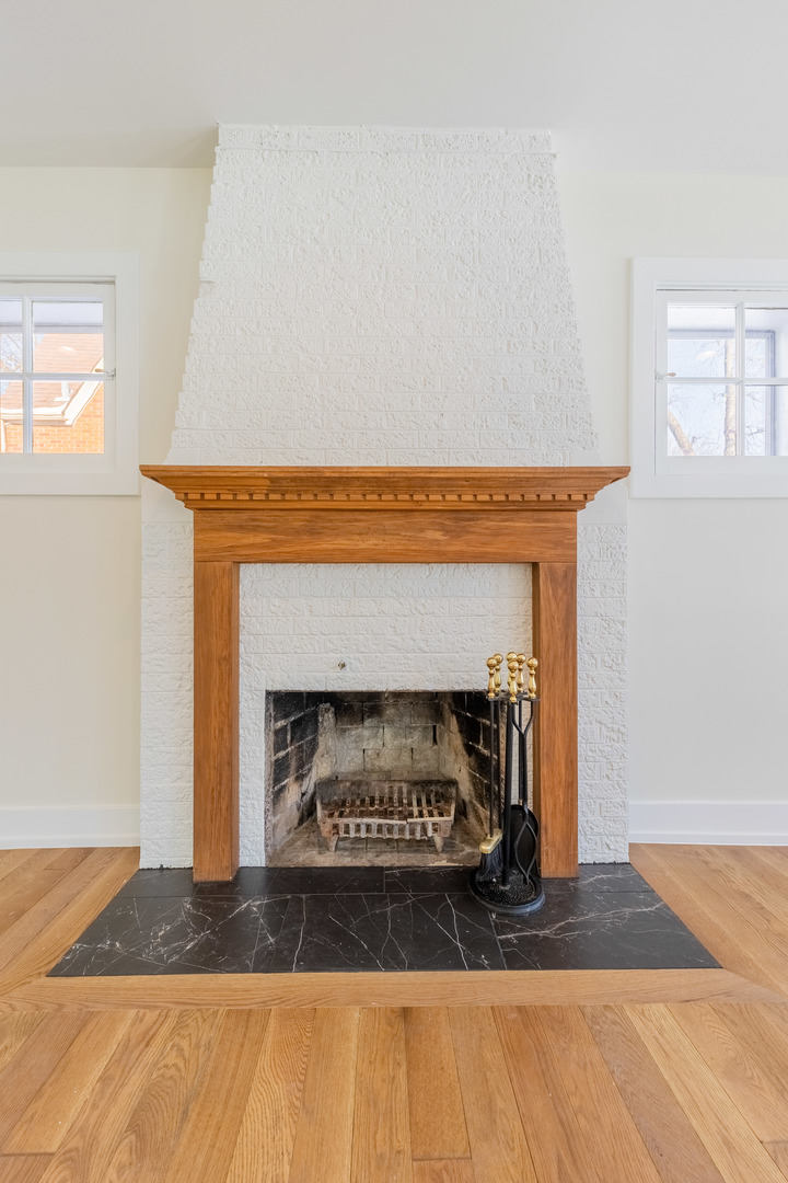 9160 South Hamilton Avenue Chicago, IL 60643 - Photo 7 of 53 a living room with a fireplace