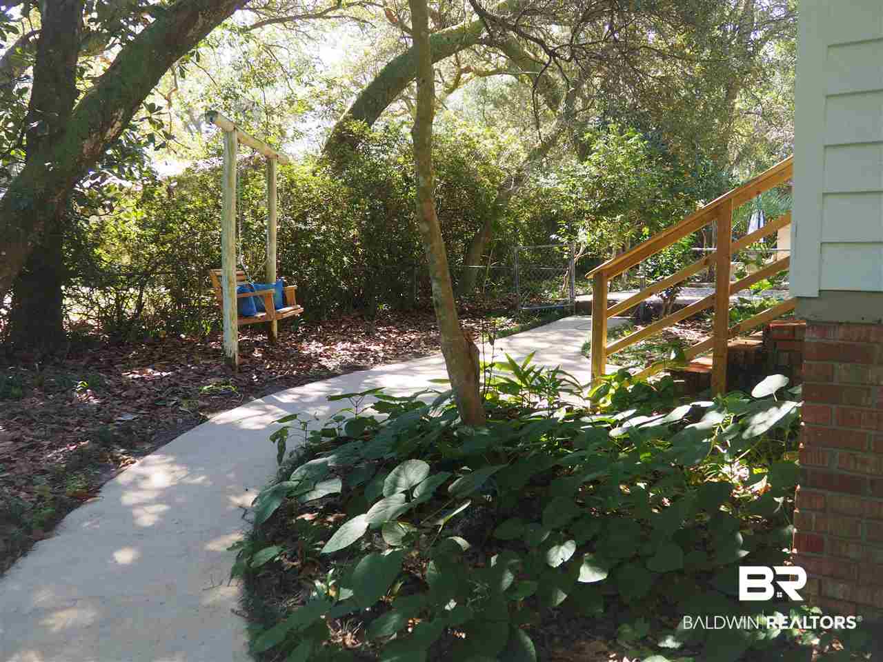 33420 Helms Lane Lillian, AL 36549 - Photo 4 of 35 Sidewalk from RV Shelter