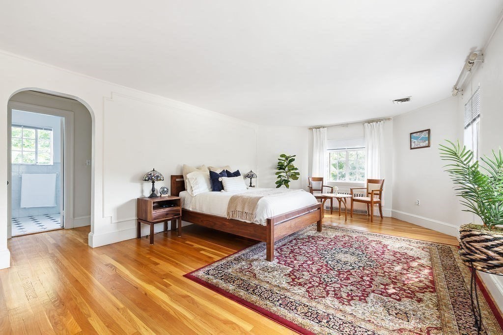 1069 West Roxbury Parkway Brookline, MA 02467 - Photo 14 of 27 a living room with furniture rug and window