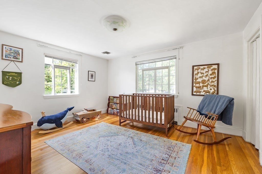 1069 West Roxbury Parkway Brookline, MA 02467 - Photo 19 of 27 a living room with furniture and a window