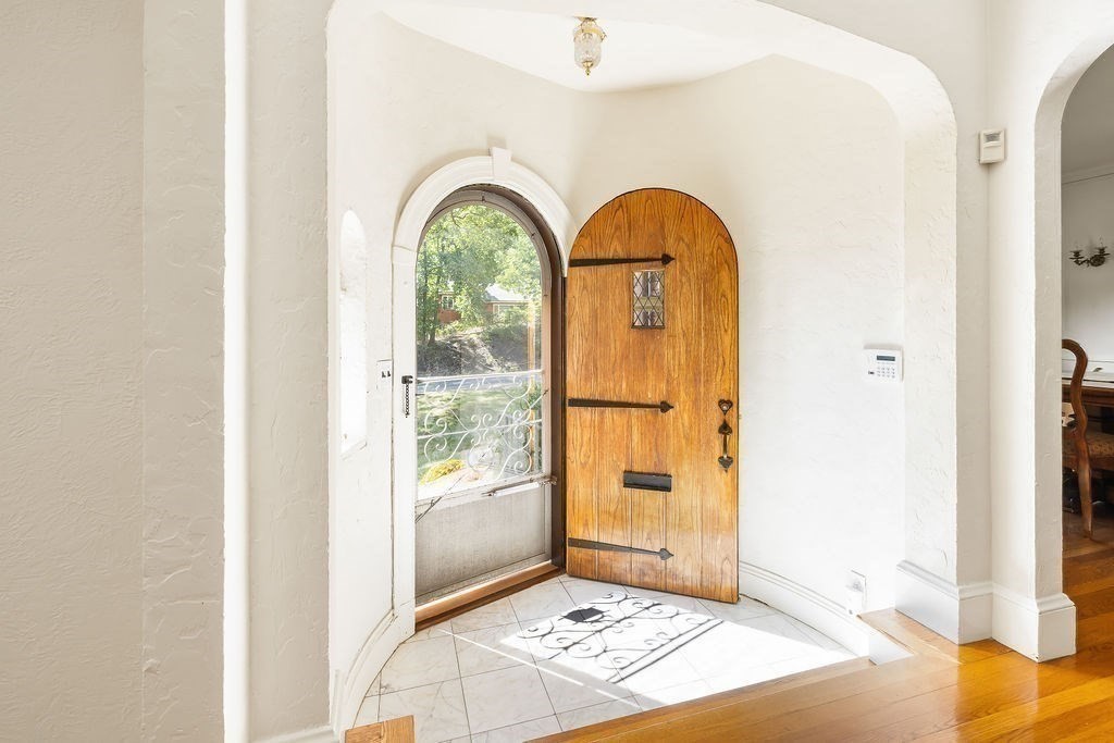 1069 West Roxbury Parkway Brookline, MA 02467 - Photo 2 of 27 a view of an entryway with a window