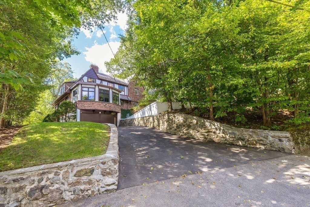 1069 West Roxbury Parkway Brookline, MA 02467 - Photo 27 of 27 a view of a house with a yard