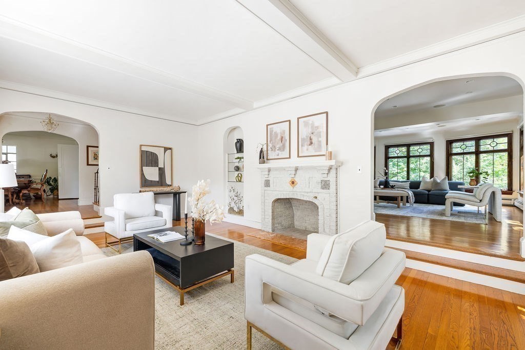 1069 West Roxbury Parkway Brookline, MA 02467 - Photo 4 of 27 a living room with furniture and a fireplace