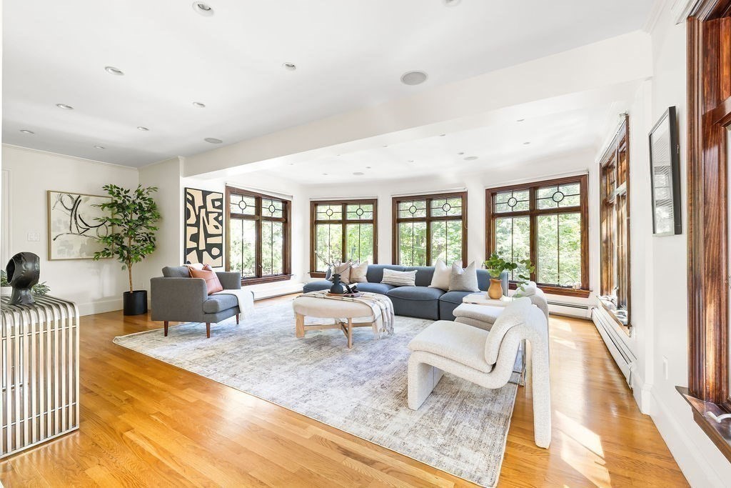 1069 West Roxbury Parkway Brookline, MA 02467 - Photo 5 of 27 a living room with furniture and a large window
