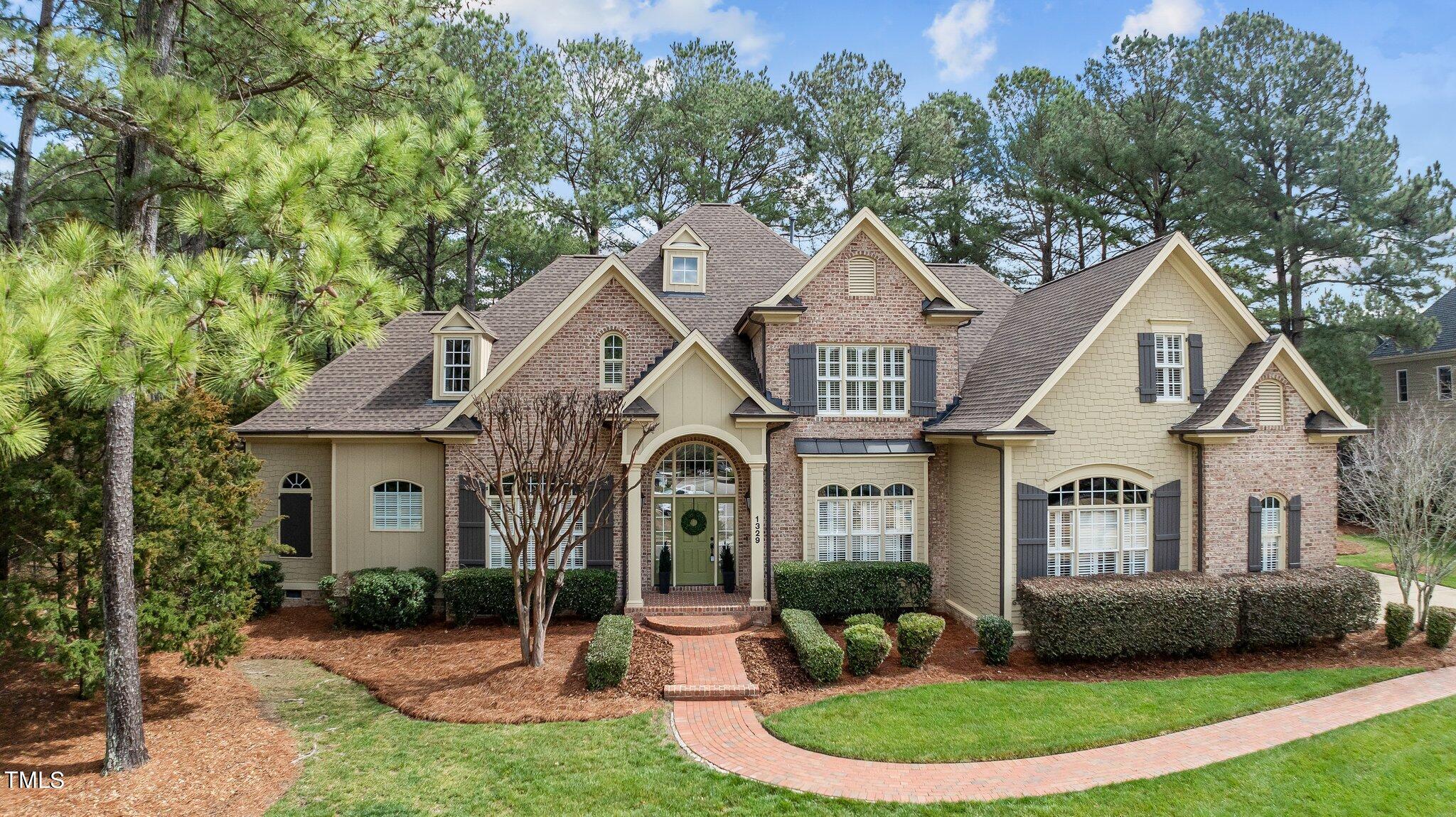 1329 Colonial Club Road Wake Forest, NC 27587 - Photo 1 of 56 1-web-or-mls-DJI_0174