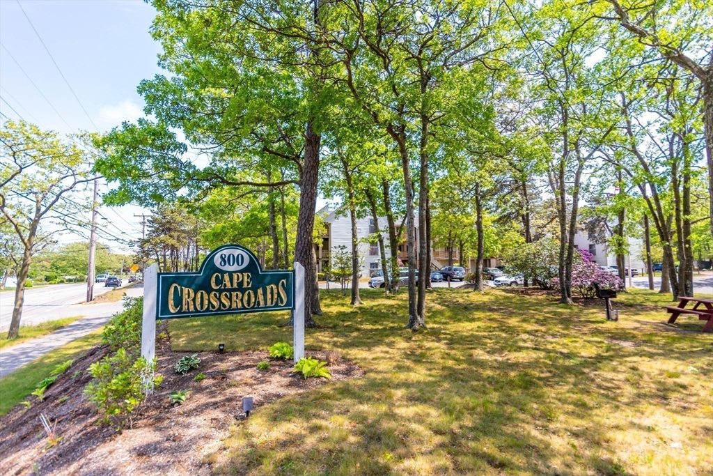 800 Bearses Way, Unit 3NE Hyannis, MA 02601 - Photo 18 of 20 a sign board with tall trees