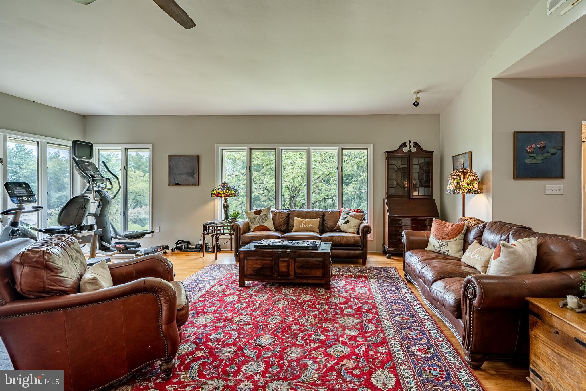 763 Denton Hollow Road West Chester, PA 19382 - Photo 15 of 80 a living room with furniture and a floor to ceiling window