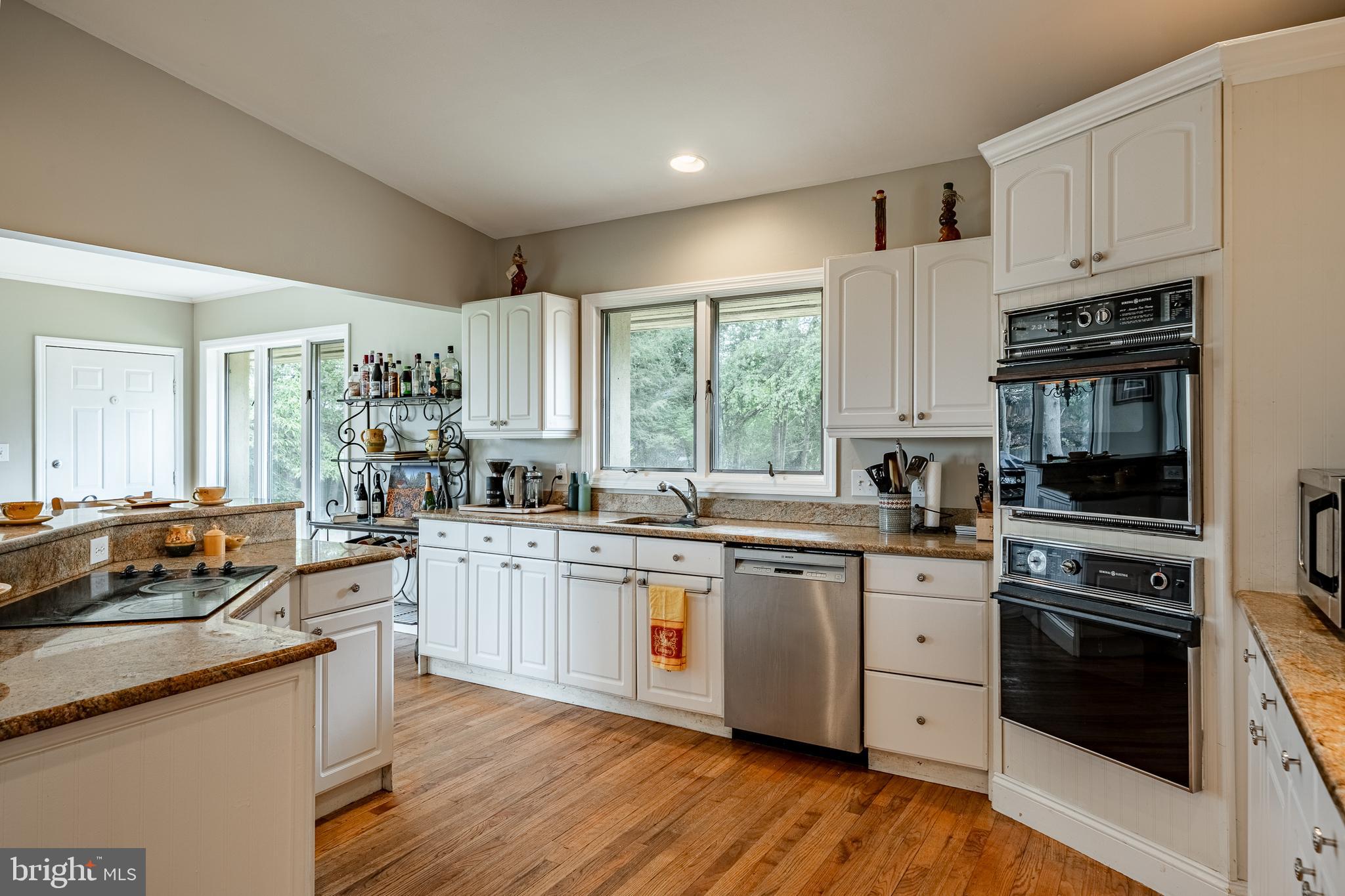 763 Denton Hollow Road West Chester, PA 19382 - Photo 20 of 80 a kitchen with stainless steel appliances a stove sink and cabinets