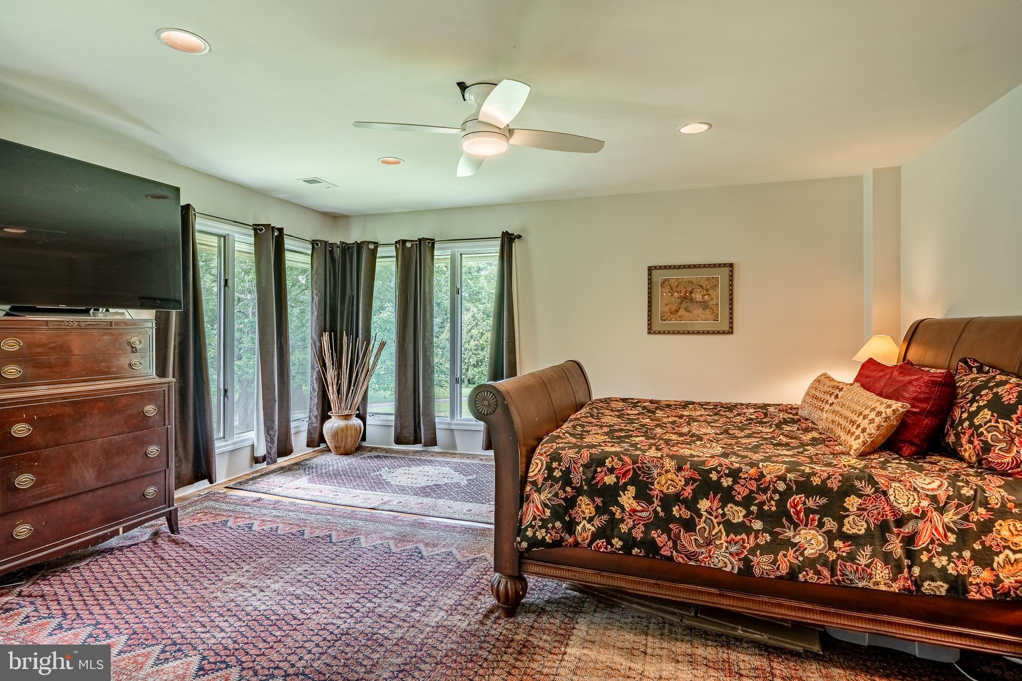 763 Denton Hollow Road West Chester, PA 19382 - Photo 24 of 80 a bedroom with a bed and a flat screen tv