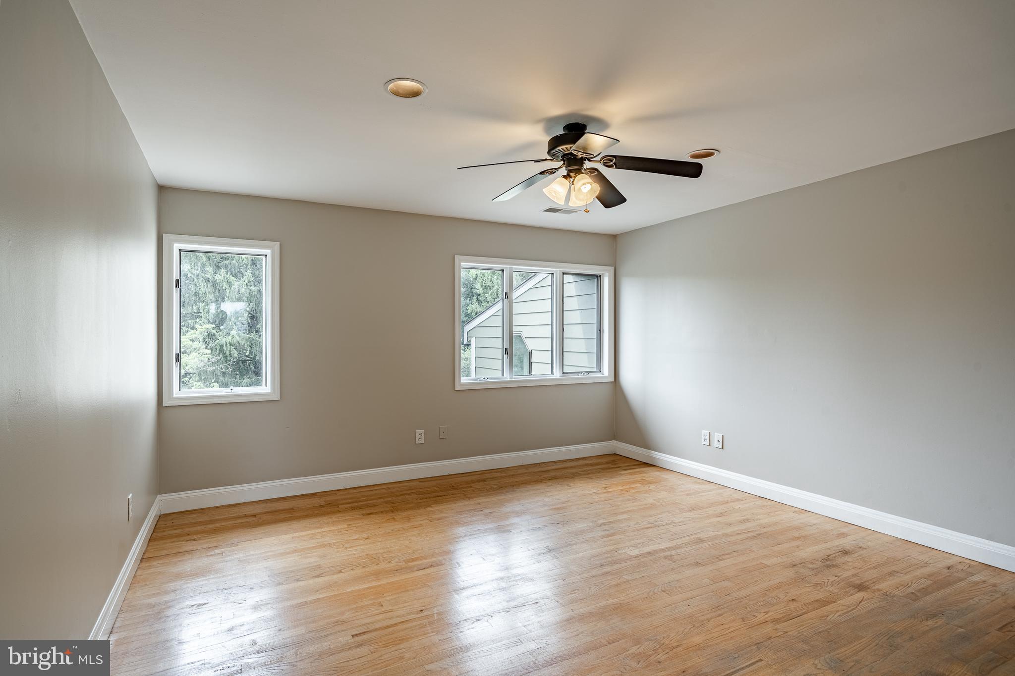 763 Denton Hollow Road West Chester, PA 19382 - Photo 42 of 80 a view of room with hardwood floor and ceiling fan