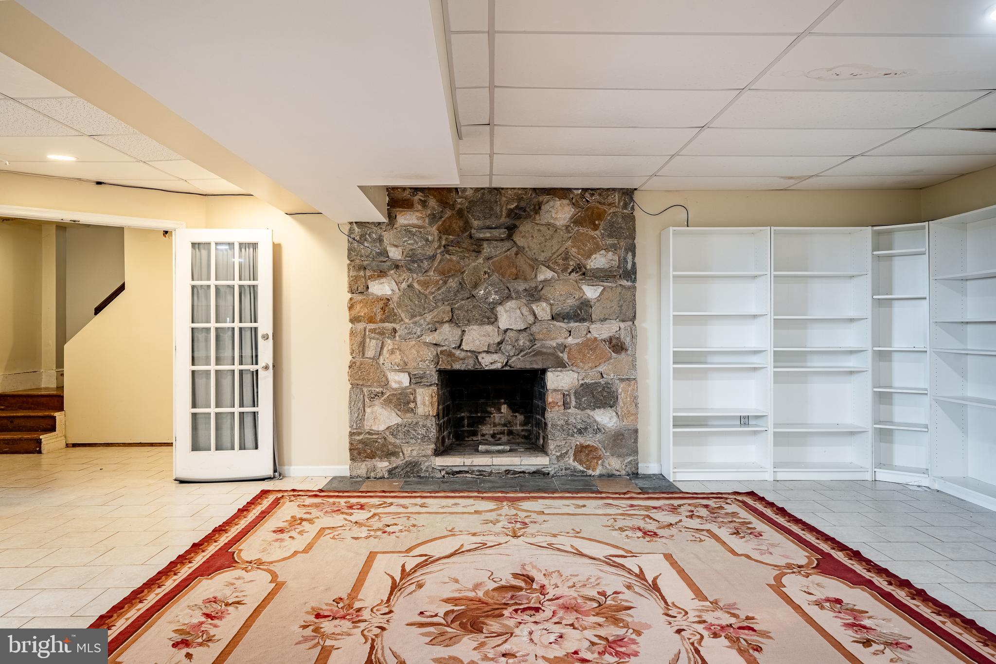 763 Denton Hollow Road West Chester, PA 19382 - Photo 46 of 80 a view of a livingroom with a fireplace and window