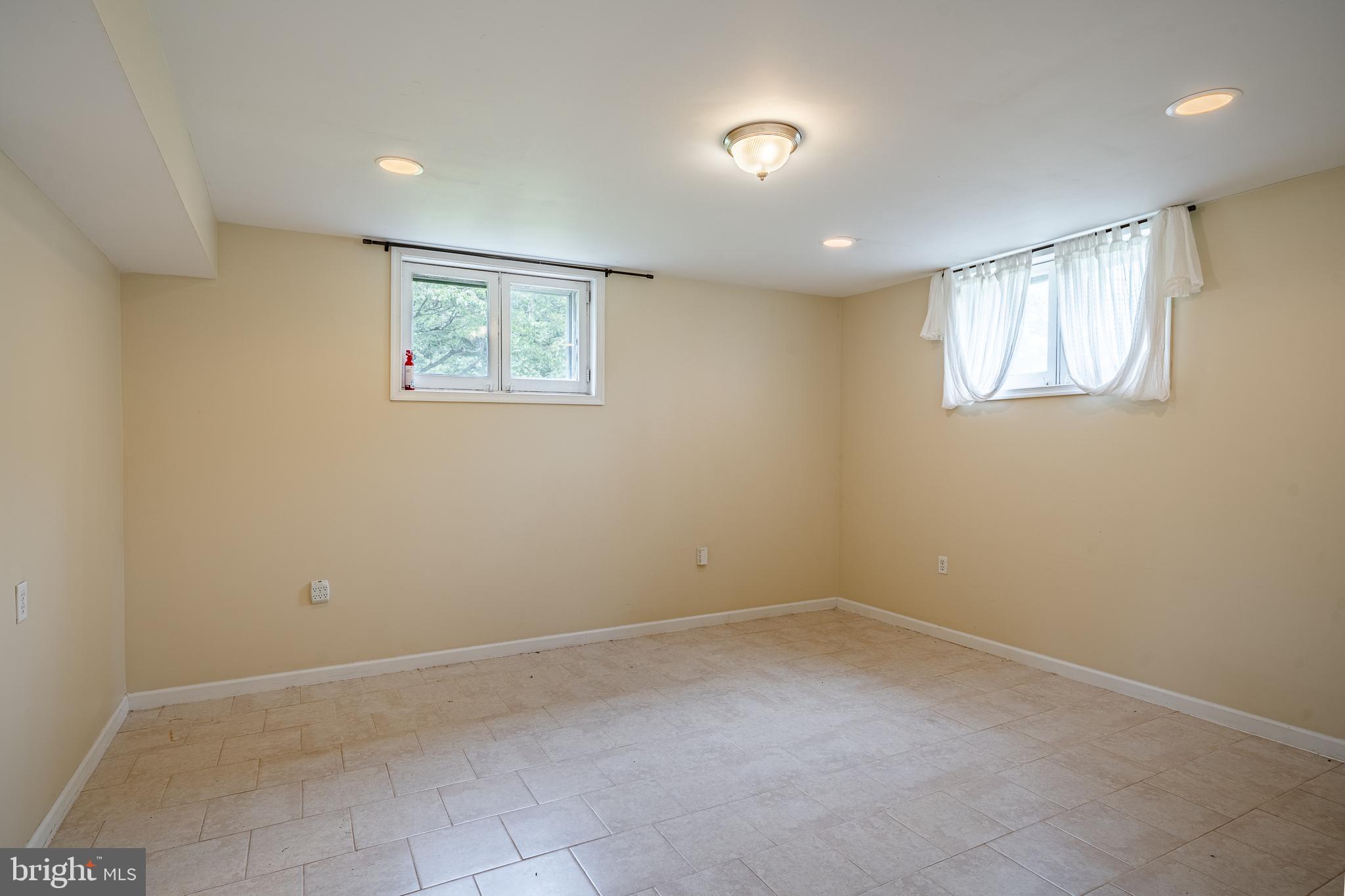 763 Denton Hollow Road West Chester, PA 19382 - Photo 48 of 80 a view of an empty room with a window