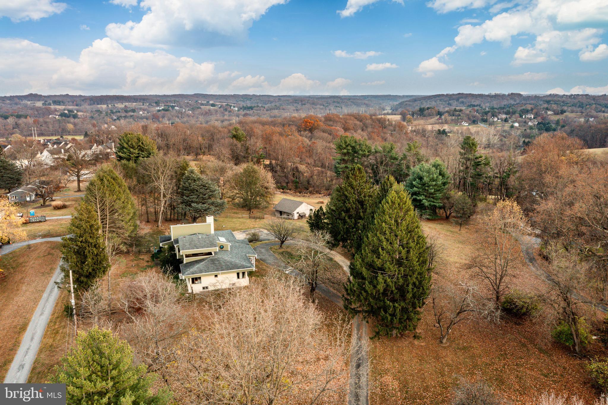 763 Denton Hollow Road West Chester, PA 19382 - Photo 71 of 80 an aerial view of a city with lots of residential buildings