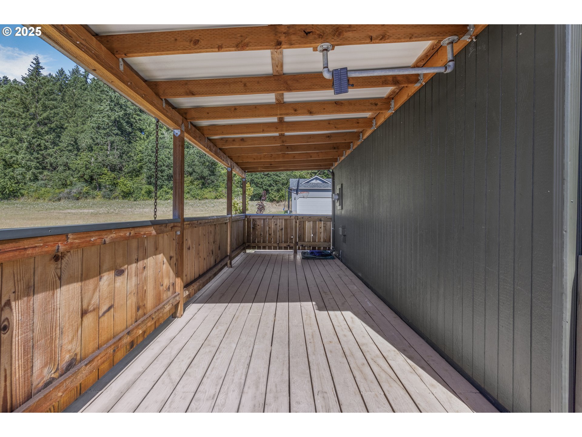 1580 South 60th Street Springfield, OR 97478 - Photo 34 of 36 a view of balcony with wooden floor