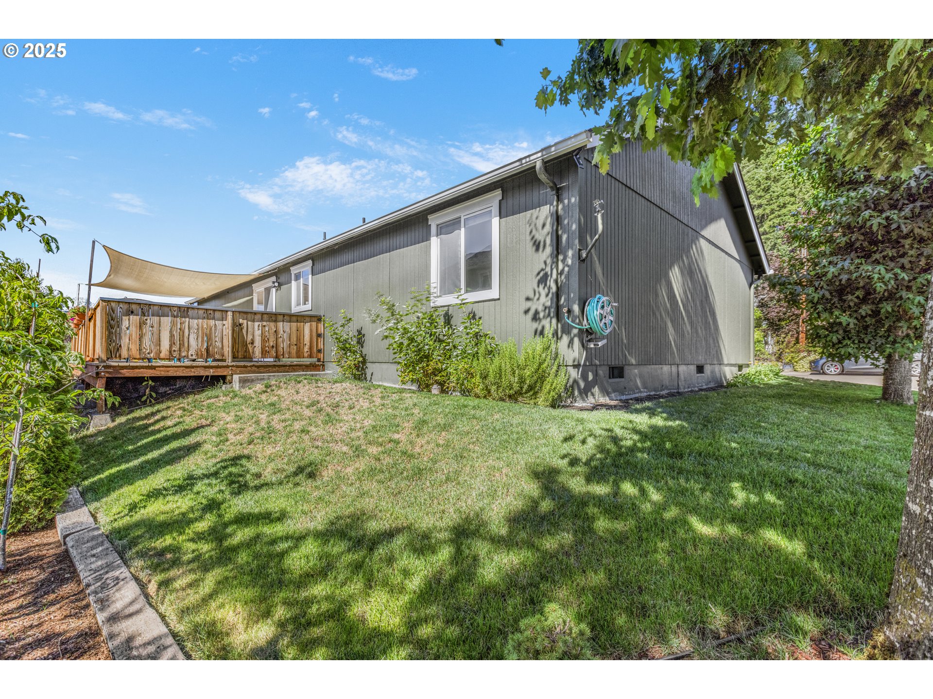 1580 South 60th Street Springfield, OR 97478 - Photo 35 of 36 a house view with a garden space