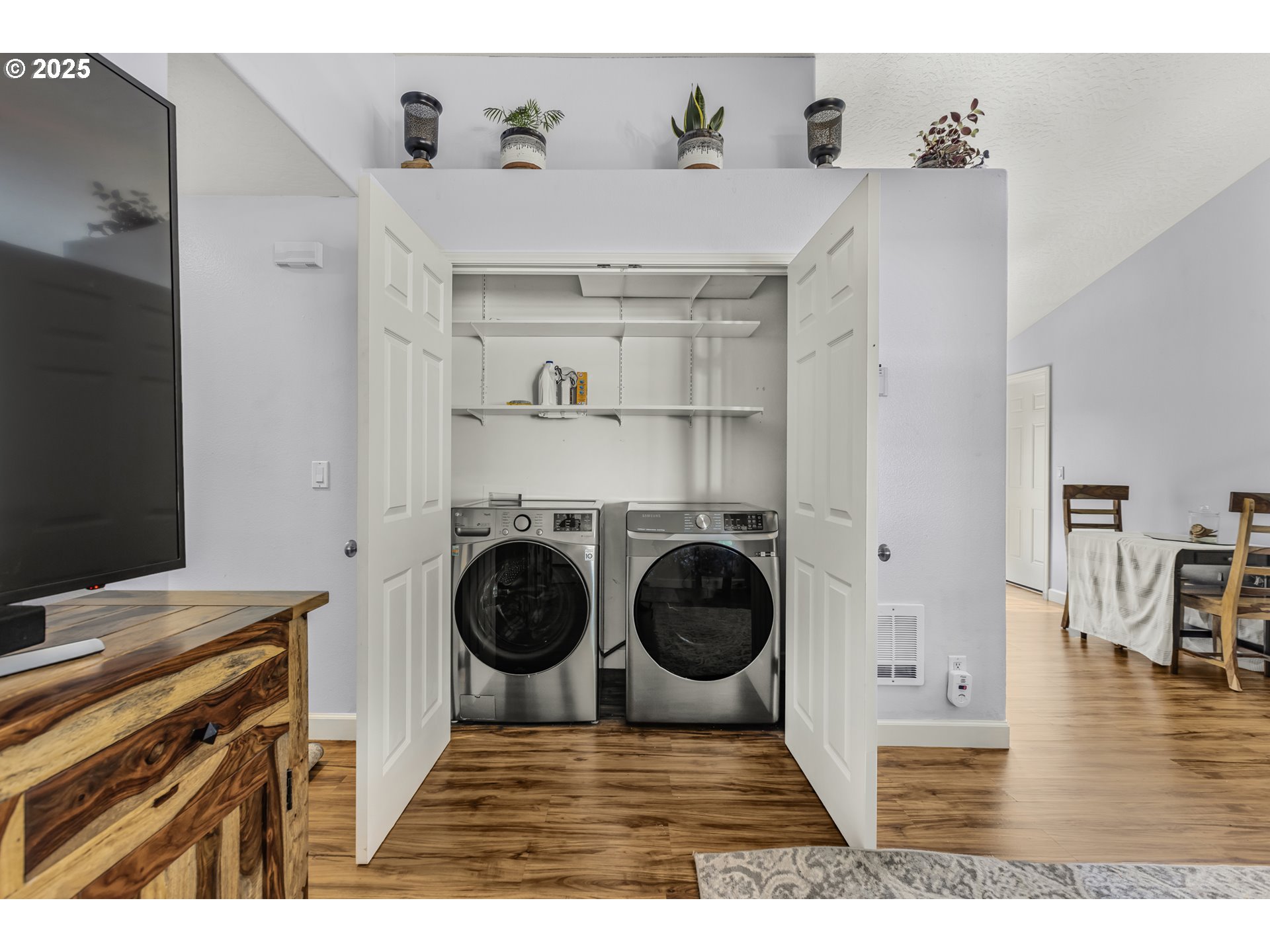 1580 South 60th Street Springfield, OR 97478 - Photo 10 of 36 a view of a kitchen with a sink washer and dryer