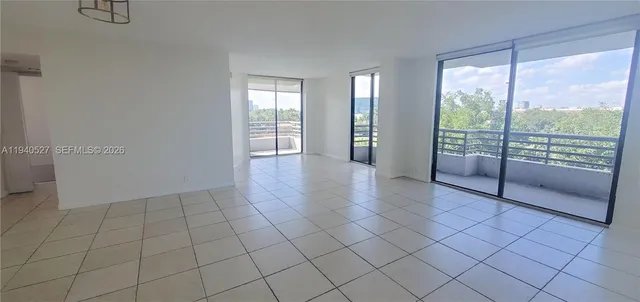 a view of an empty room and window