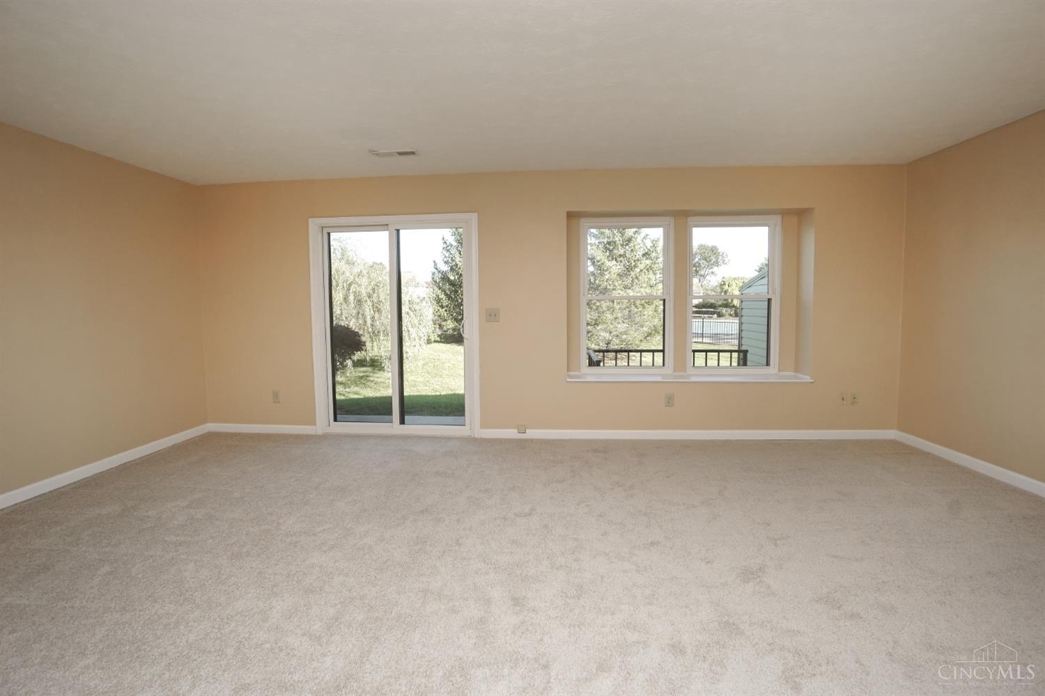 7902 Hackney Circle Maineville, OH 45039 - Photo 4 of 33 Family room on main floor with access to the patio.