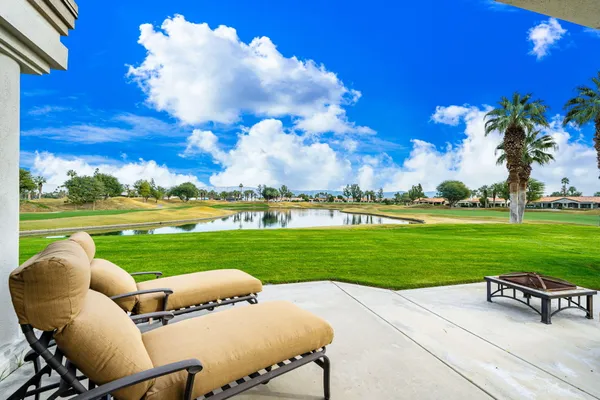 a view of a garden and outdoor seating