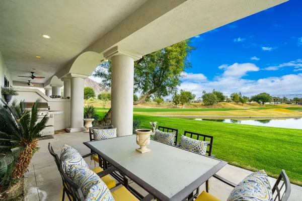 a garden view with a seating space