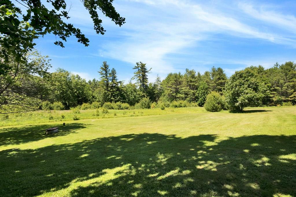 325 Oak Hill Road Standish, ME 04084 - Photo 5 of 34 Back yard. Rock walls on left and...