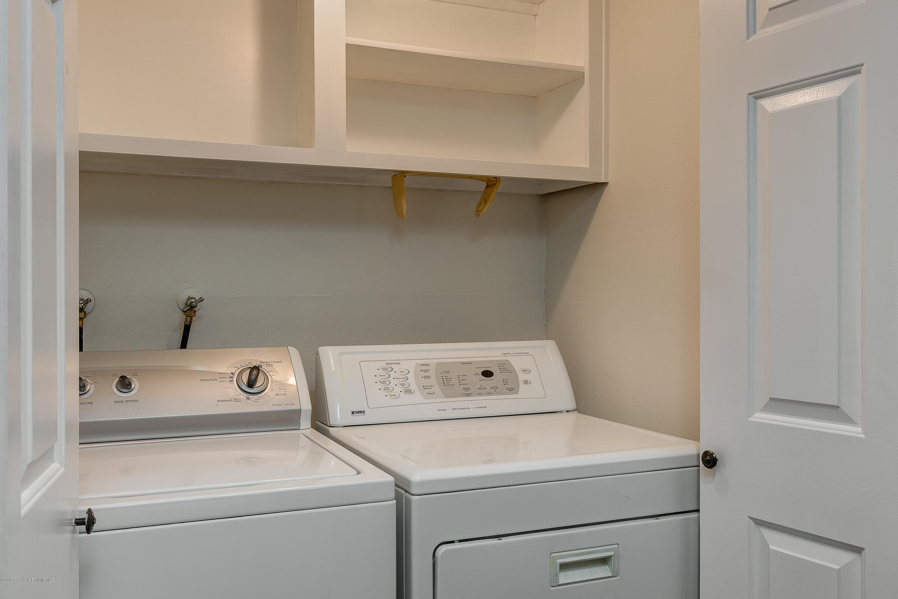 124 Monterey Road, Unit 218 South Pasadena, CA 91030 - Photo 17 of 20 a utility room with dryer and washer
