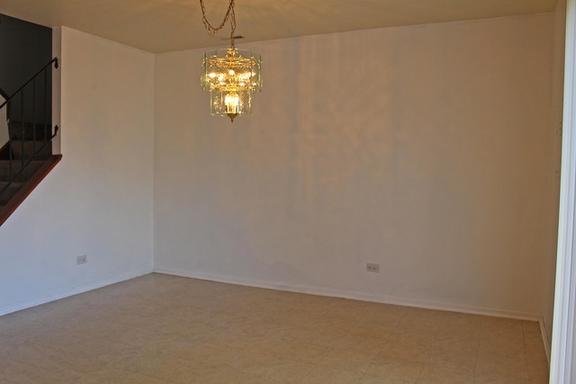 461 Minnesota Circle Carol Stream, IL 60188 - Photo 6 of 15 a view of empty room with window