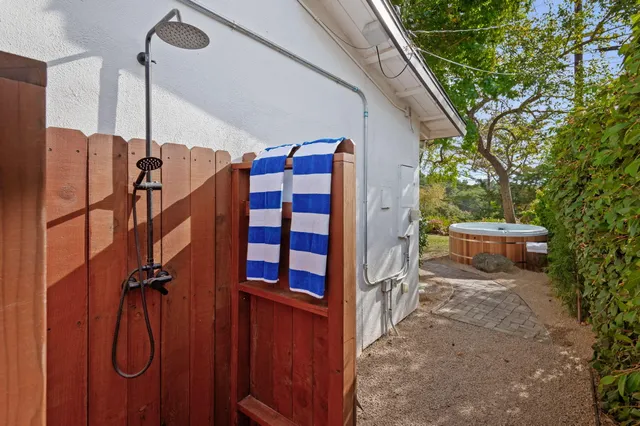 a bed room with a bed and a table