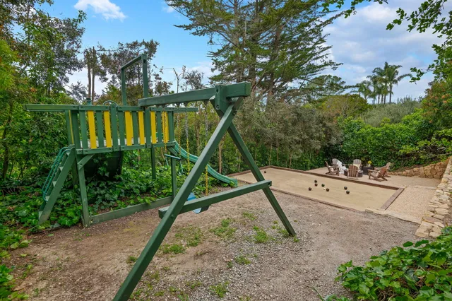 a spacious bedroom with a bed and window