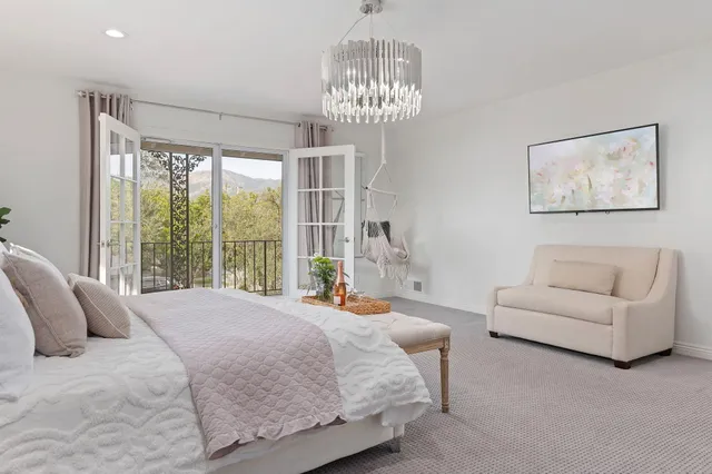 a backyard of a house with yard and outdoor seating