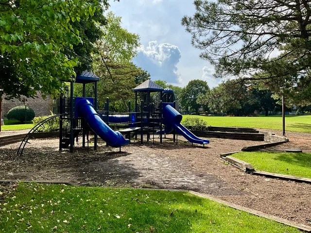 a view of a park with slide