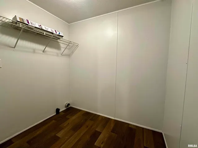 a view of a room with racks on the wall