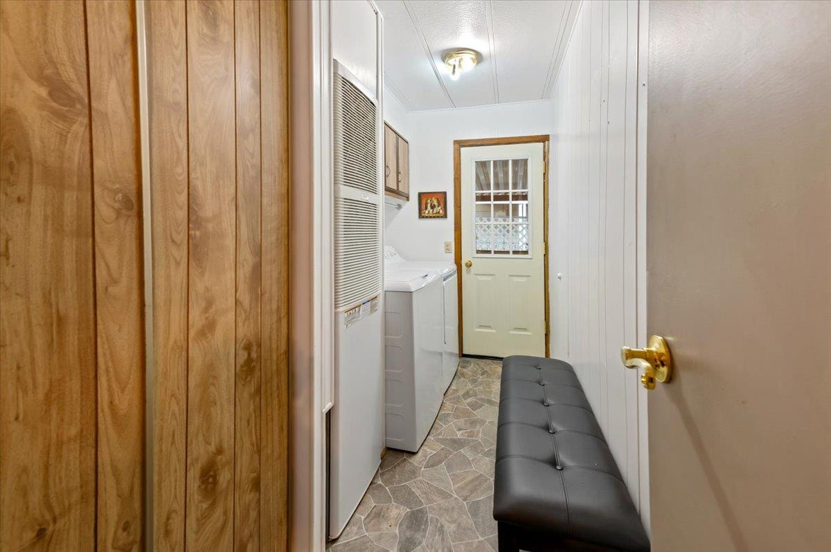 27 Primrose Lane Grass Valley, CA 95945 - Photo 25 of 44 a view of a hallway with wooden shelves