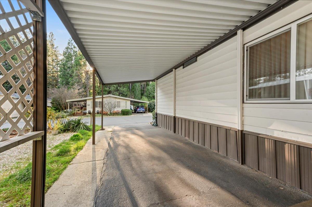27 Primrose Lane Grass Valley, CA 95945 - Photo 30 of 44 a view of a house with backyard and porch